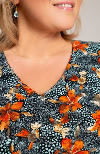 Asymmetrische Bluse aus orangefarbenen Lilien